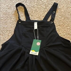 HALARA Black Jumpsuit with Black Button Accents